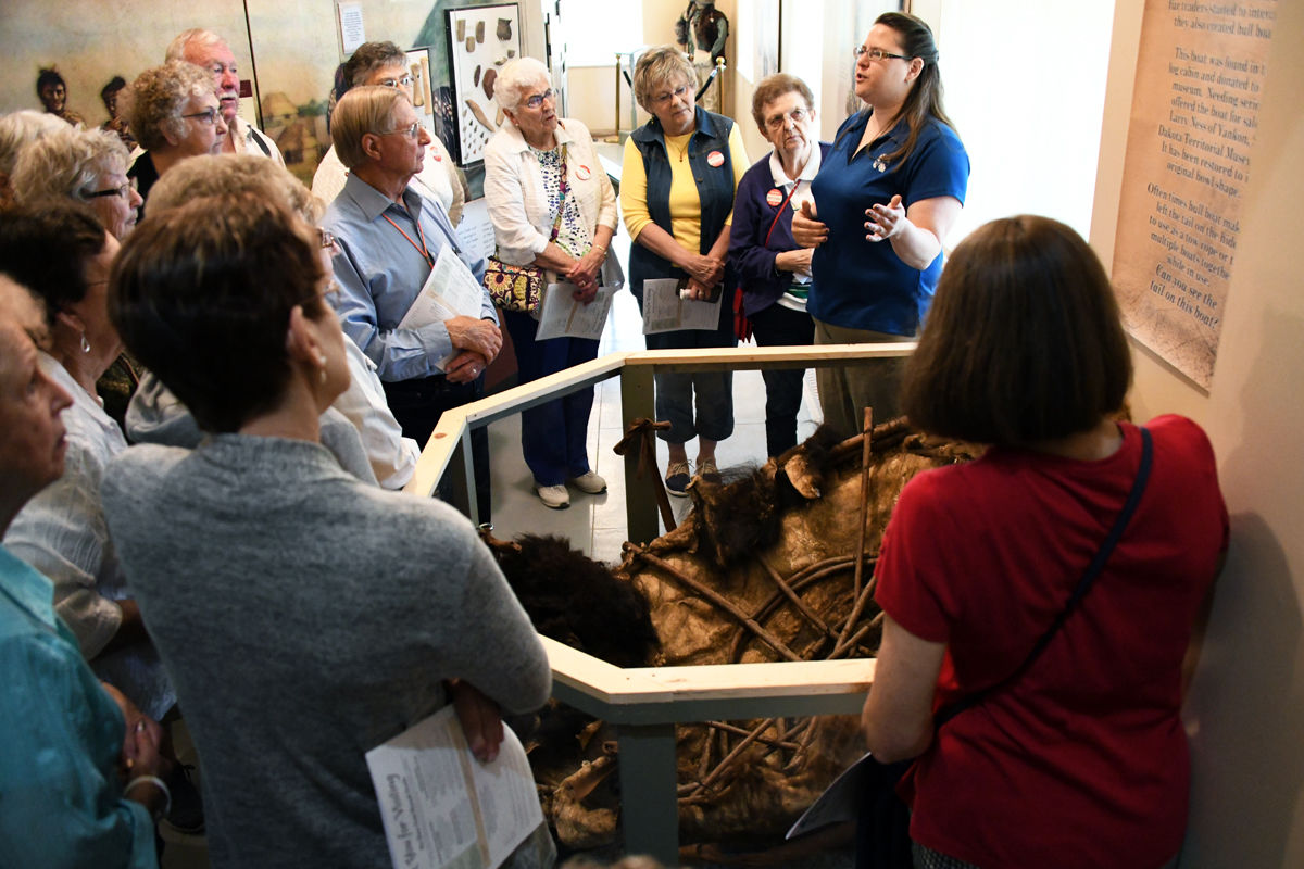 074 The tour leader explained the construction and uses of the Bull Boat.JPG